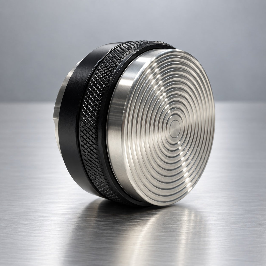 Reverse tamping face of the 58 mm dual sided coffee distributor and tamper