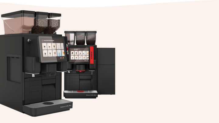 Schaerer Coffee Skye black machine in foreground; additional manufacturer configuration shown behind